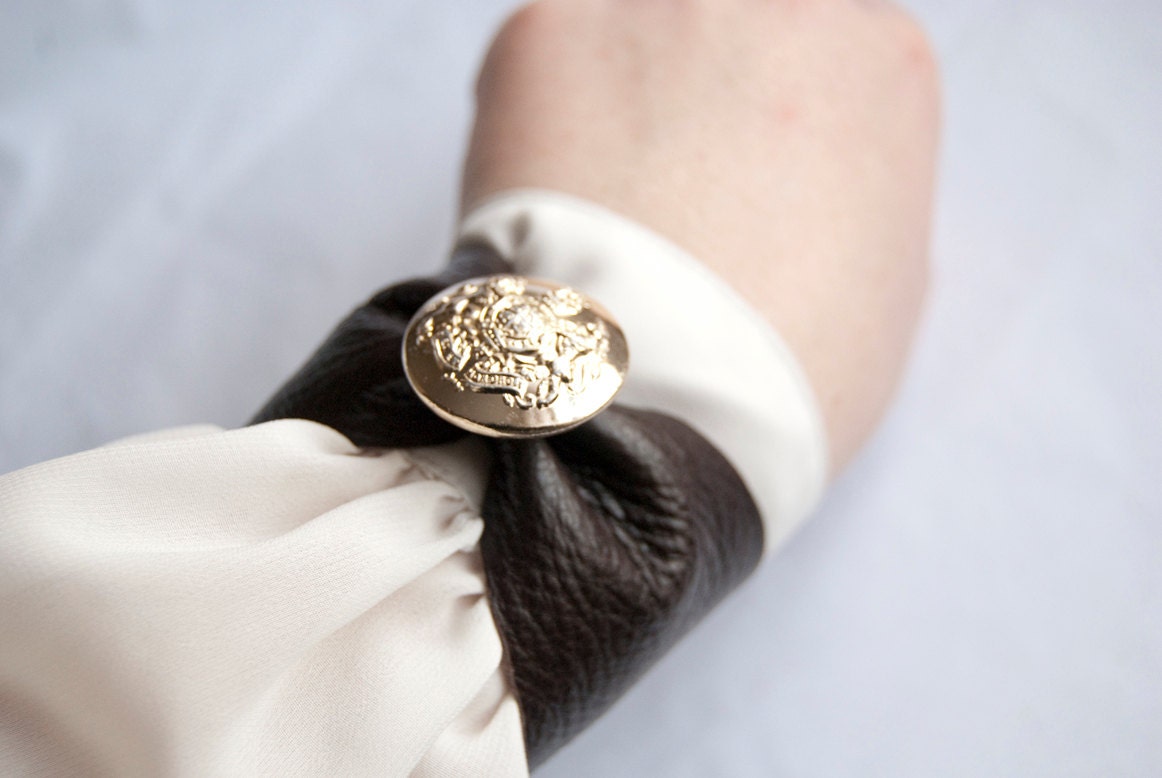 Leather cuff with vintage military button