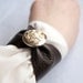 Leather cuff with vintage military button