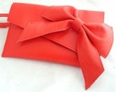 Red Leather clutch bag with beautiful big bow embellishment.