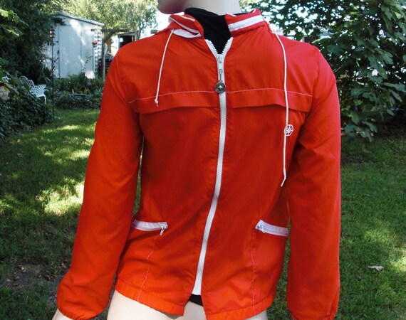 This kind of windbreaker. When jackets still had neck strings