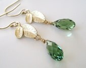 Greenley  ...matte gold leaf charm and green erinite Swarovski briolette dangle drop earrings. Available in other colors.