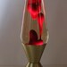 Vintage Eames Era Red and Gold 1976 Original Astro Lava Lamp with Starlight Base
