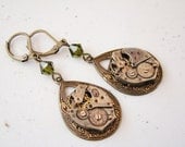 olivine clockwork doublet.  steampunk victorian antique watch earrings.