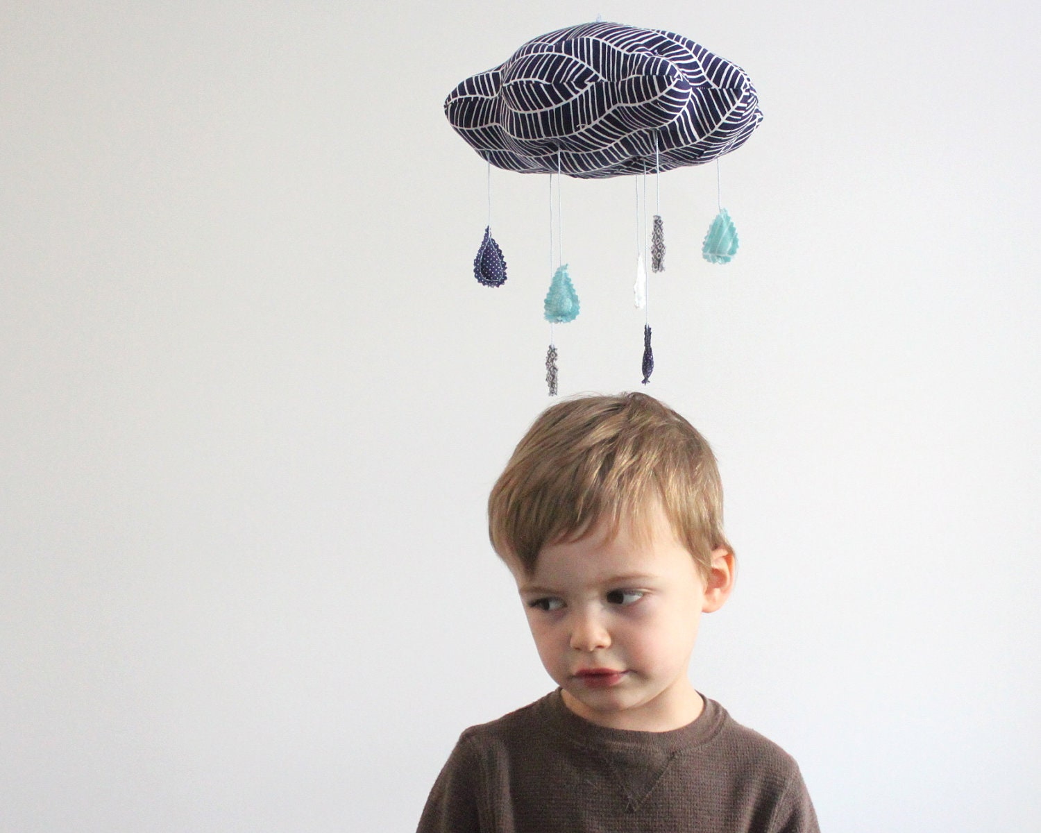 Little Storm Cloud Mobile - fabric sculpture for baby nursery decor in gray, navy, white, and dusk blue