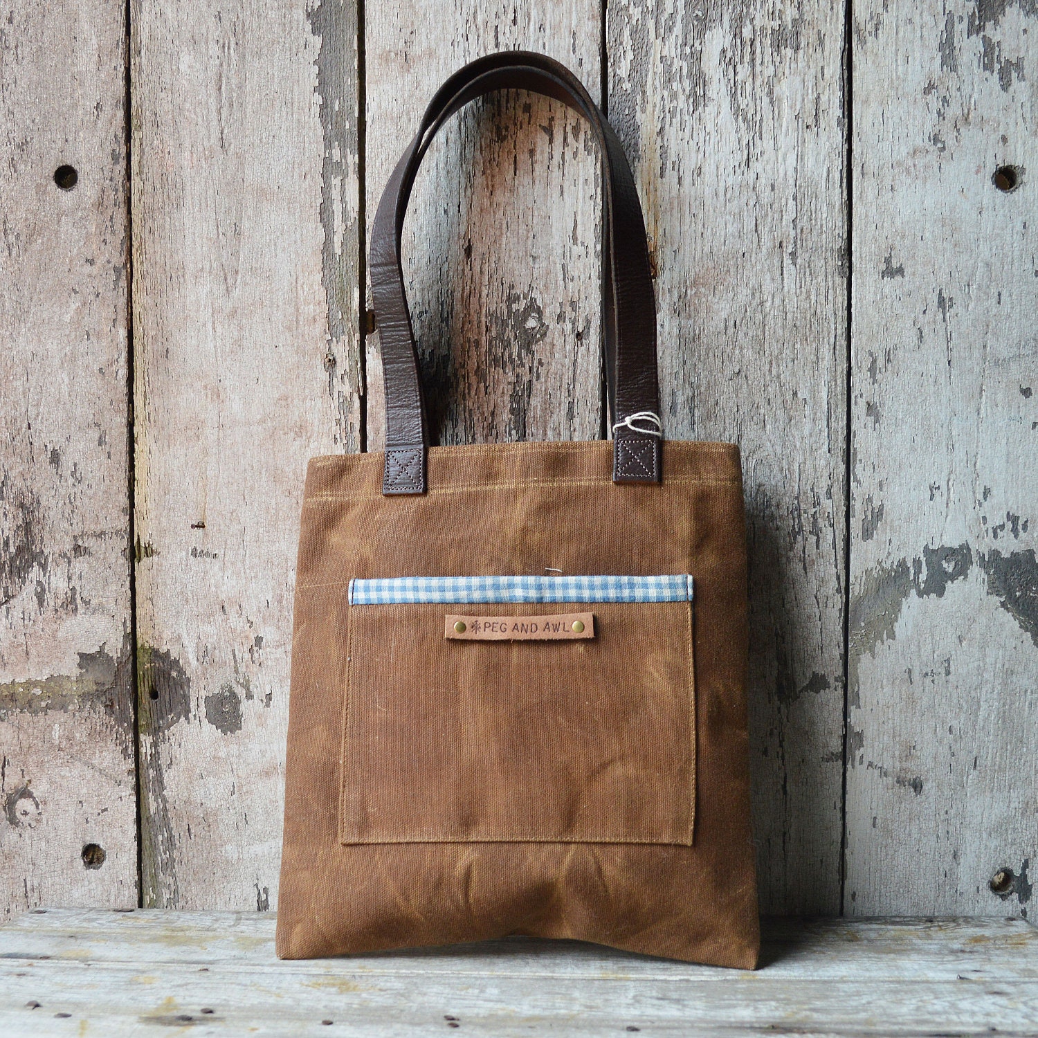Waxed Canvas Reader: Spice, antique military leather, antique fabric.