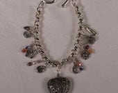 Charm Bracelet - silver linked bracelet, pewter charms, czech glass beads, 7 inches