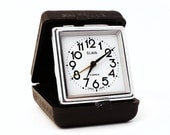 Vintage travel alarm clock Slava from Russia Soviet union era