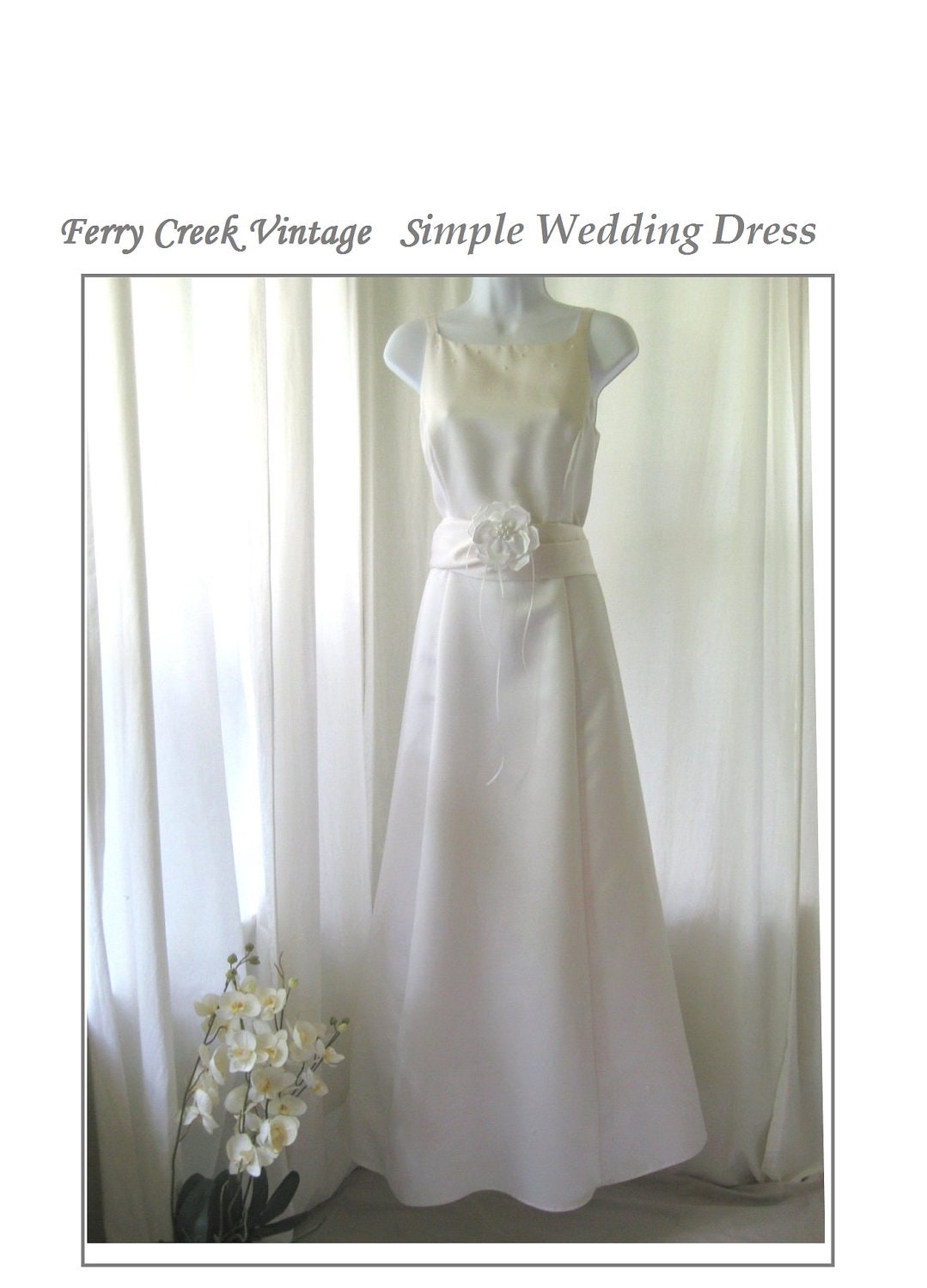 Beautiful and Simple Wedding Dress Size 8 Beaded at Hem &  Neckline Includes Includes  Bridal Sash and Bridal Floral Clip.