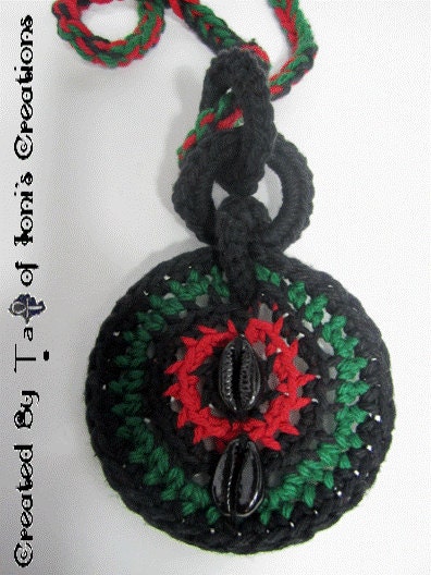 Red Black and Green Circle Pendant with 2 Cowries and Braid Chain