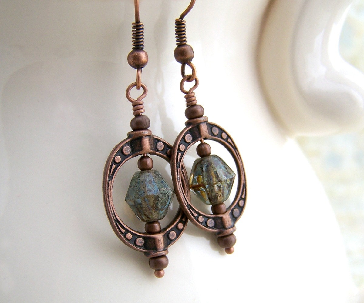 Green Steampunk Earrings with spinning Saturn bead frames of copper - Green earrings of Czech glass beads with a Picasso finish