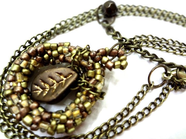 Light Brown Beaded Pendant Necklace Beaded with Leaf Circle Center