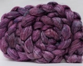 Reddish-purple semisolid 50/50 superwash merino/tencel spinning fiber (roving, combed top), 4 oz