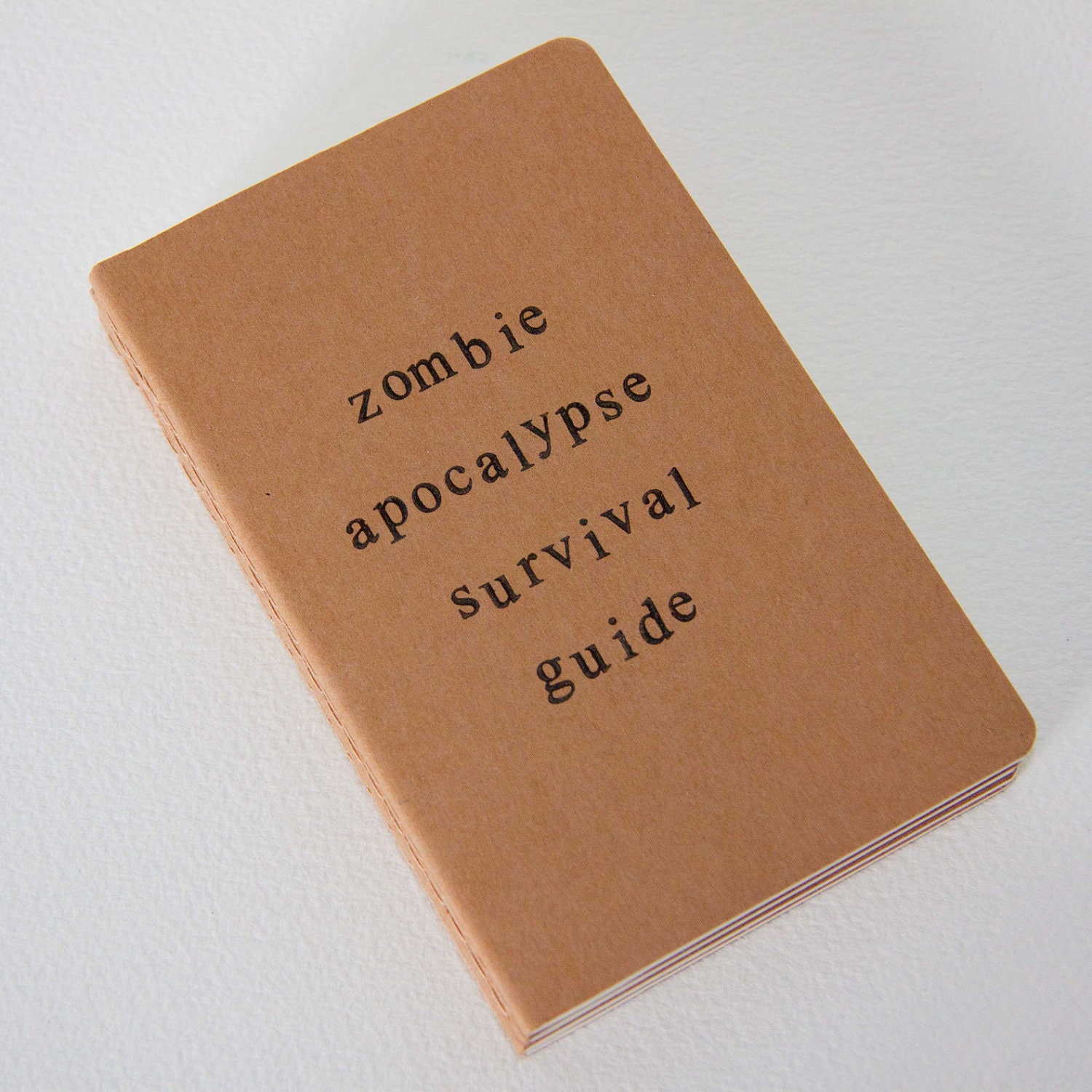 zombie apocalypse survival guide - hand stamped moleskine notebook pocket size