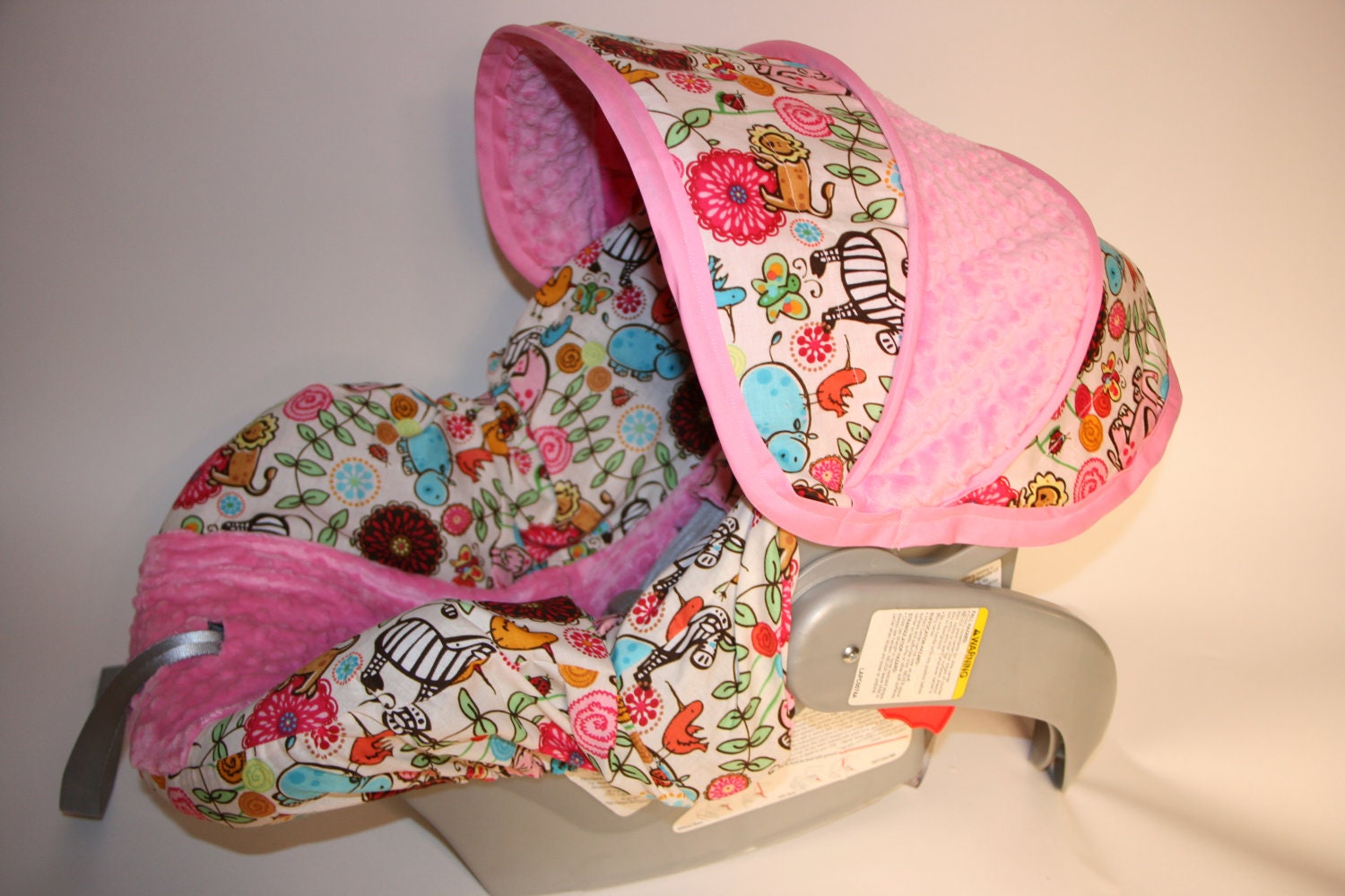 Infant car seat cover made with Safari Fabric and hot pink minky- Custom Order made by Baby Seat Covers by Jill
