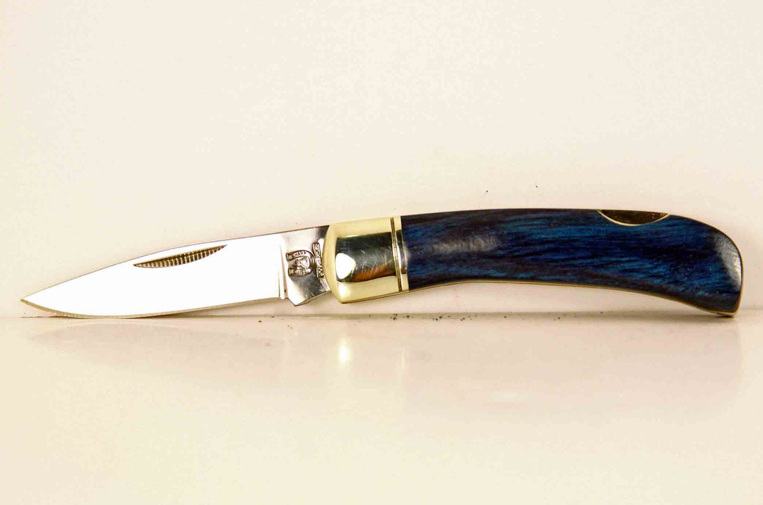 Rough Rider pocket knife with custom Blue Dymondwood handle