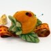 Persimmon and Ladybug Felted Wrist Pincushion
