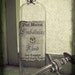 Antique Bottle with Embalming Fluid Label