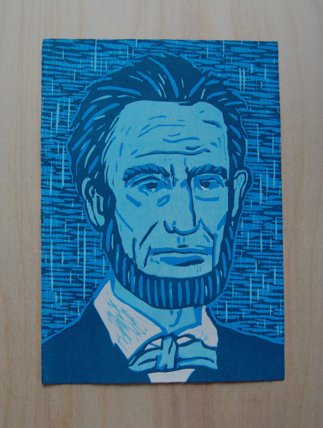 Blue Lincoln, 10.5 x 7", reductive woodcut, limited edition