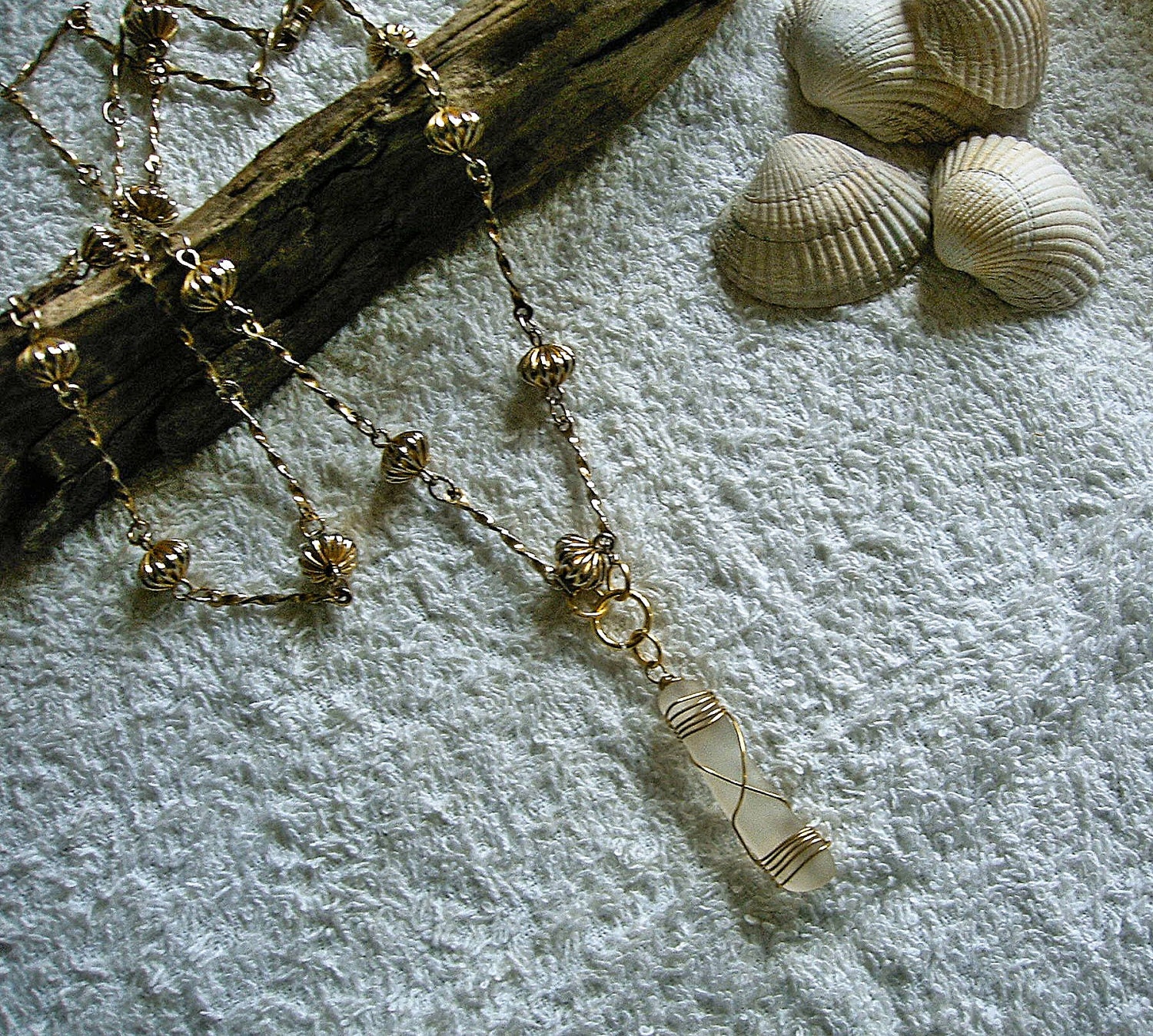 Sea glass wire wrapped necklace with vintage chain. Beach jewelry.