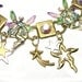 Charm Fairy Bracelet, fairy bracelet, fey charm bracelet, upcycled, recycled, eco friendly, fairy jewelry, fantasy jewellery, ooak