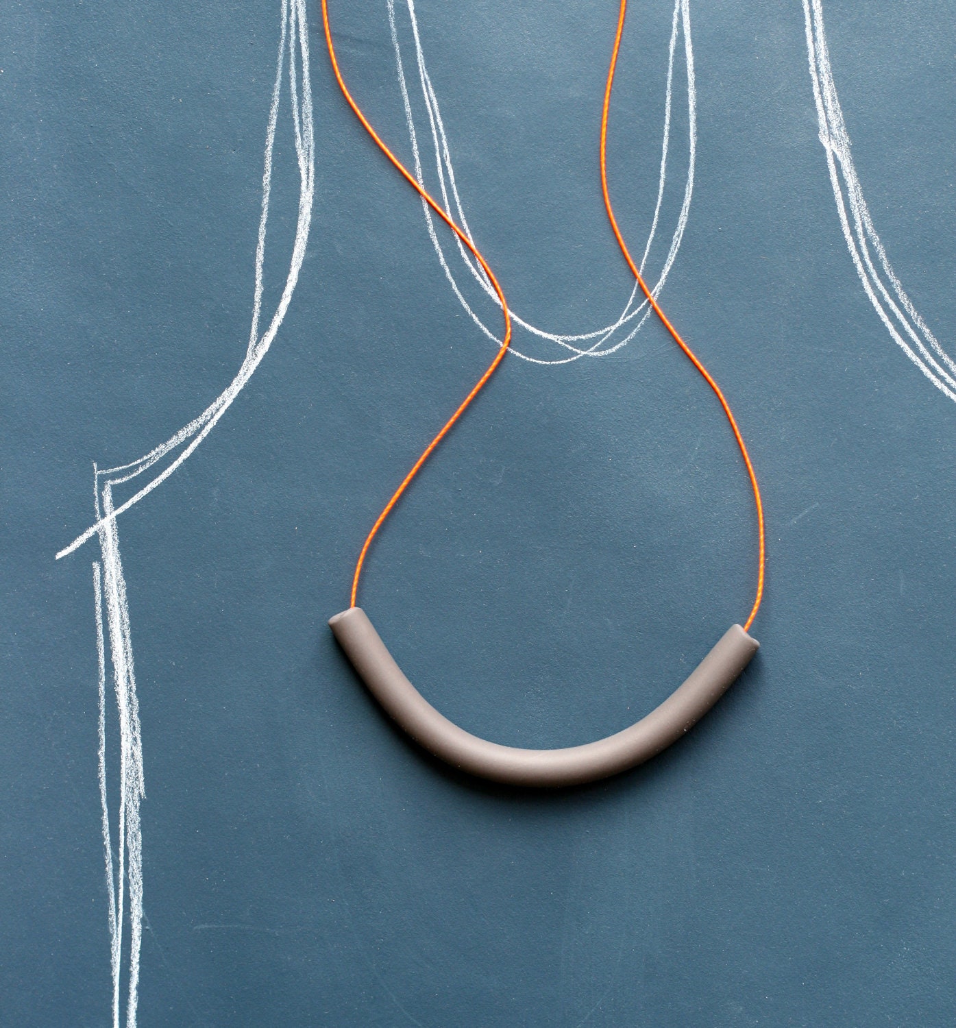 not quite a semi circle makes a necklace