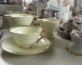 French vintage coffee or tea set in pale yellow.