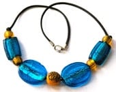 Chunky  Beaded Necklace.  Brightly colored.  Blue and Orange Glass and altered beads. Funky art jewellry.