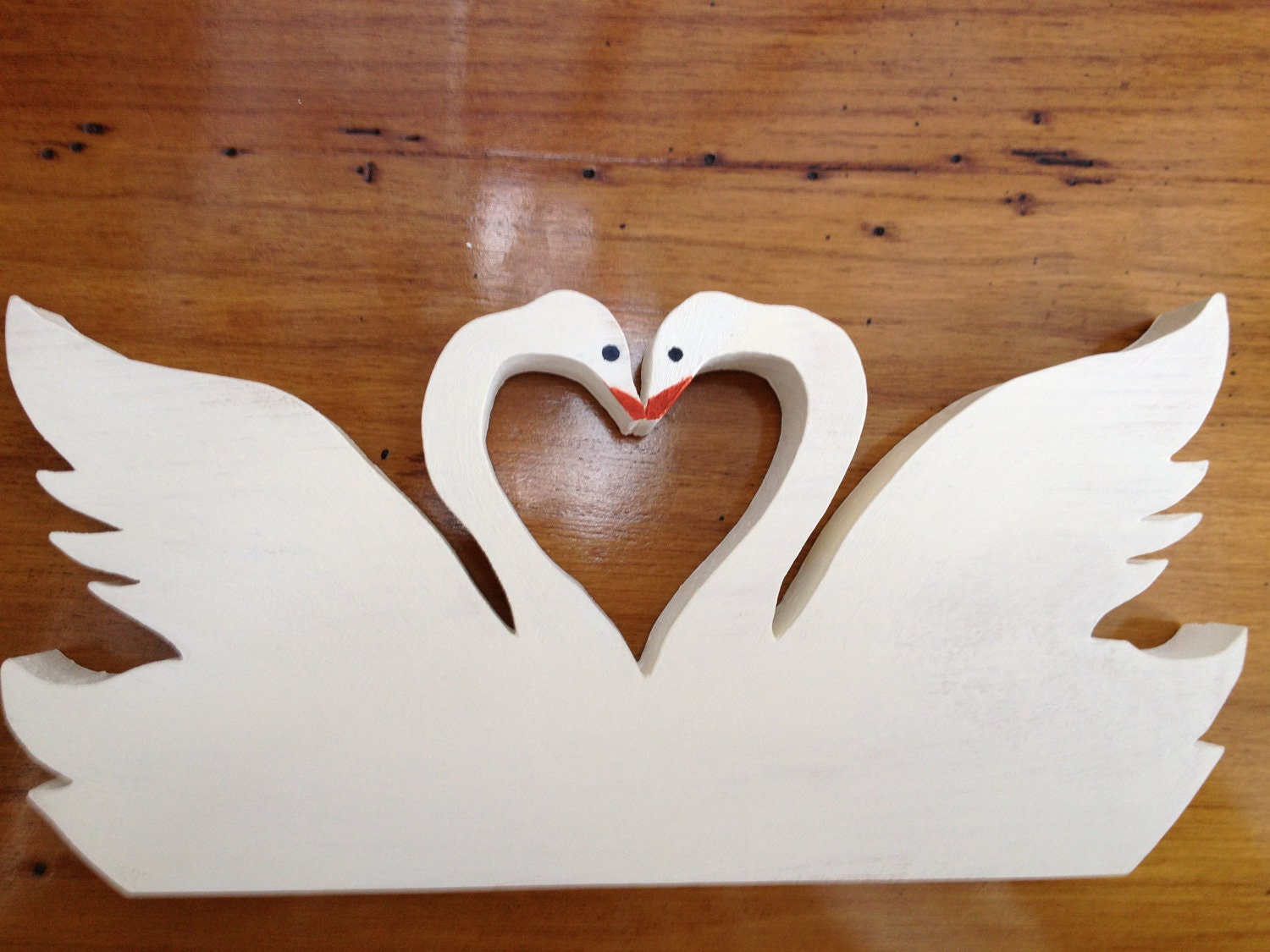Wooden Swans Kissing