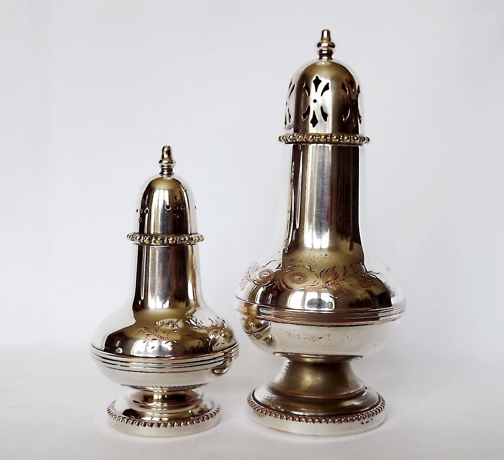 RESERVED - Two silver plated sugar shakers or muffineers from England - hand engraved