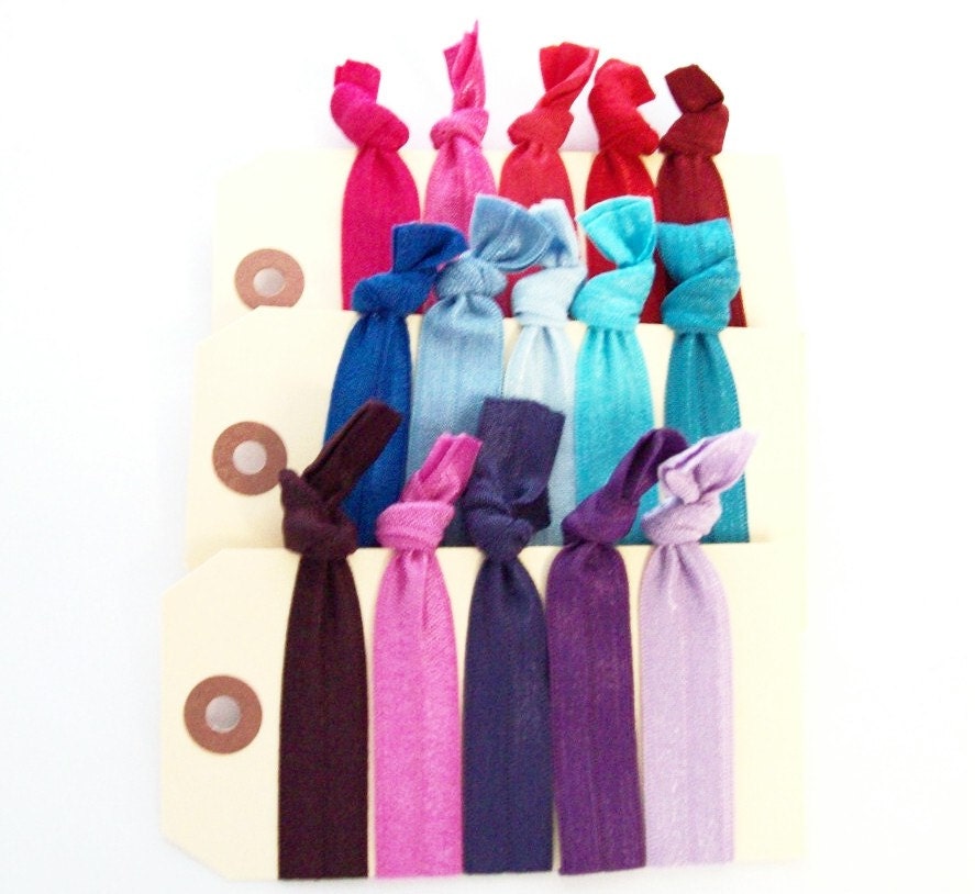 set of 30 elastic hair ties hair accessories in shades of purple, blue and red