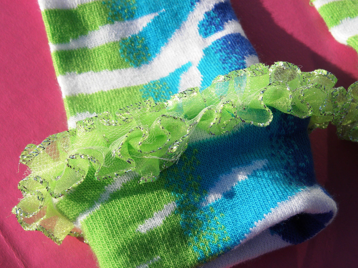 Baby Leg Warmers: Zebra Stripes of Turquoise, Lime Green, Blue, and White with Green Ruffle Trim