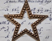 Star stamping with dots, oxidized brass