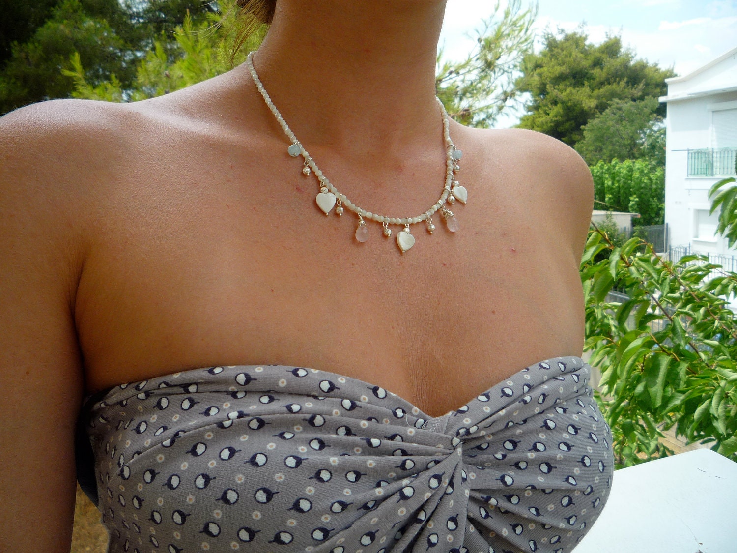 Mother of Pearl necklace with Mother of Pearl Hearts, Sterling Silver beads ,Rose Quartz briolettes and Aquamarine rondelle drops.