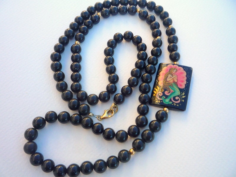 Black Obsidian semiprecious stones necklace  with gold filled beads and focal rectangle Onyx bead with mermaid painting.