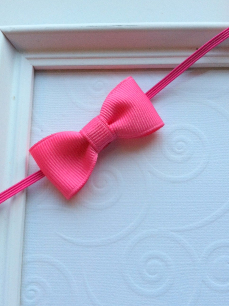 Pink Mini Tuxedo Bow attached to a Pink Skinny Elastic Headband