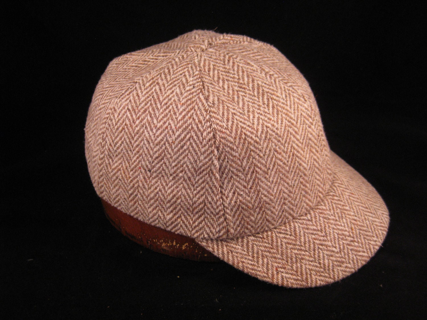 Herringbone wool cap with soft cotton sweatband, size 7 1/4, other sizes available.