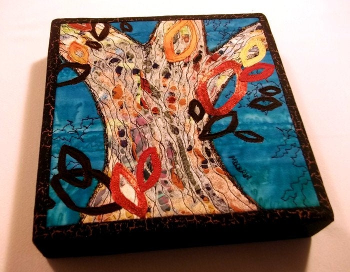 Fiber art quilt, abstract design of tree trunk on batik background, mounted on 8"x8" canvas stretcher bars