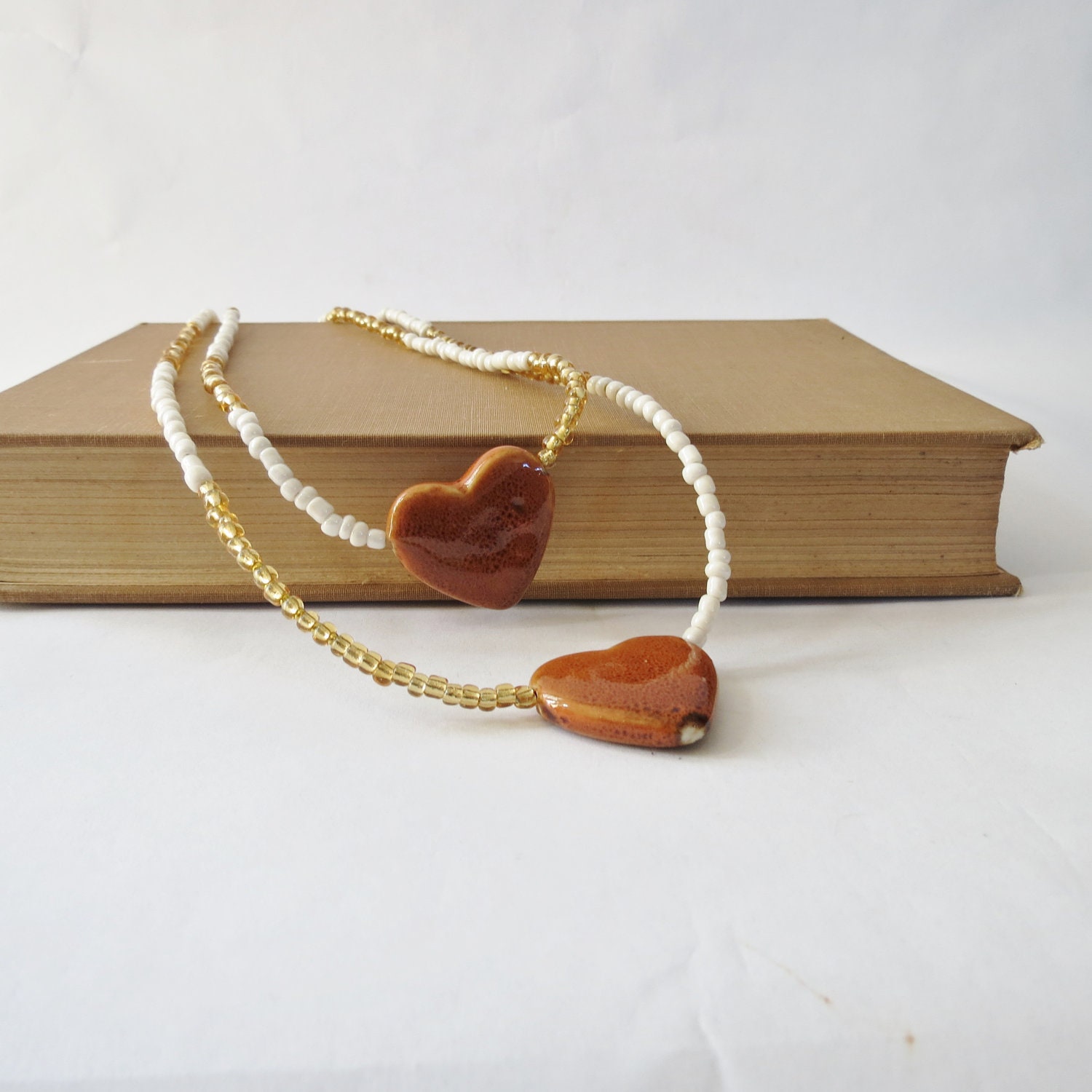 Two Hearts Ceramic and Glass Beaded Necklace in Honey, Gold, and Ivory // Gift for Her - atticphilosopher
