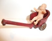Cast Iron Dollhouse Miniature Red Push Cart and doll circa 1920