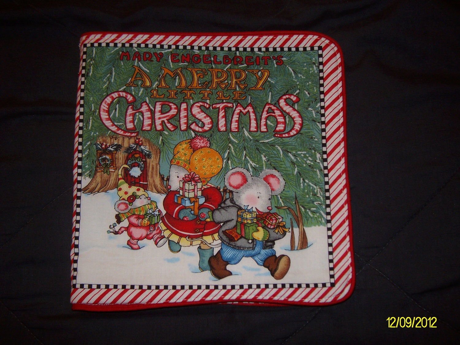 A Merry Little Christmas Soft Cloth  Book with MICE      in bright bold colors and piping around the edges