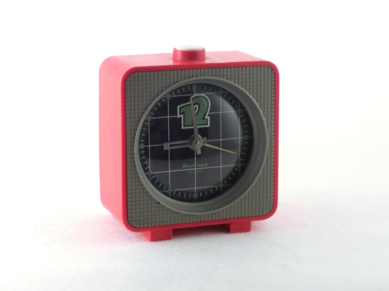 Vintage red alarm clock  made in Russia