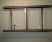 Rustic antique wooden bookshelf ladder