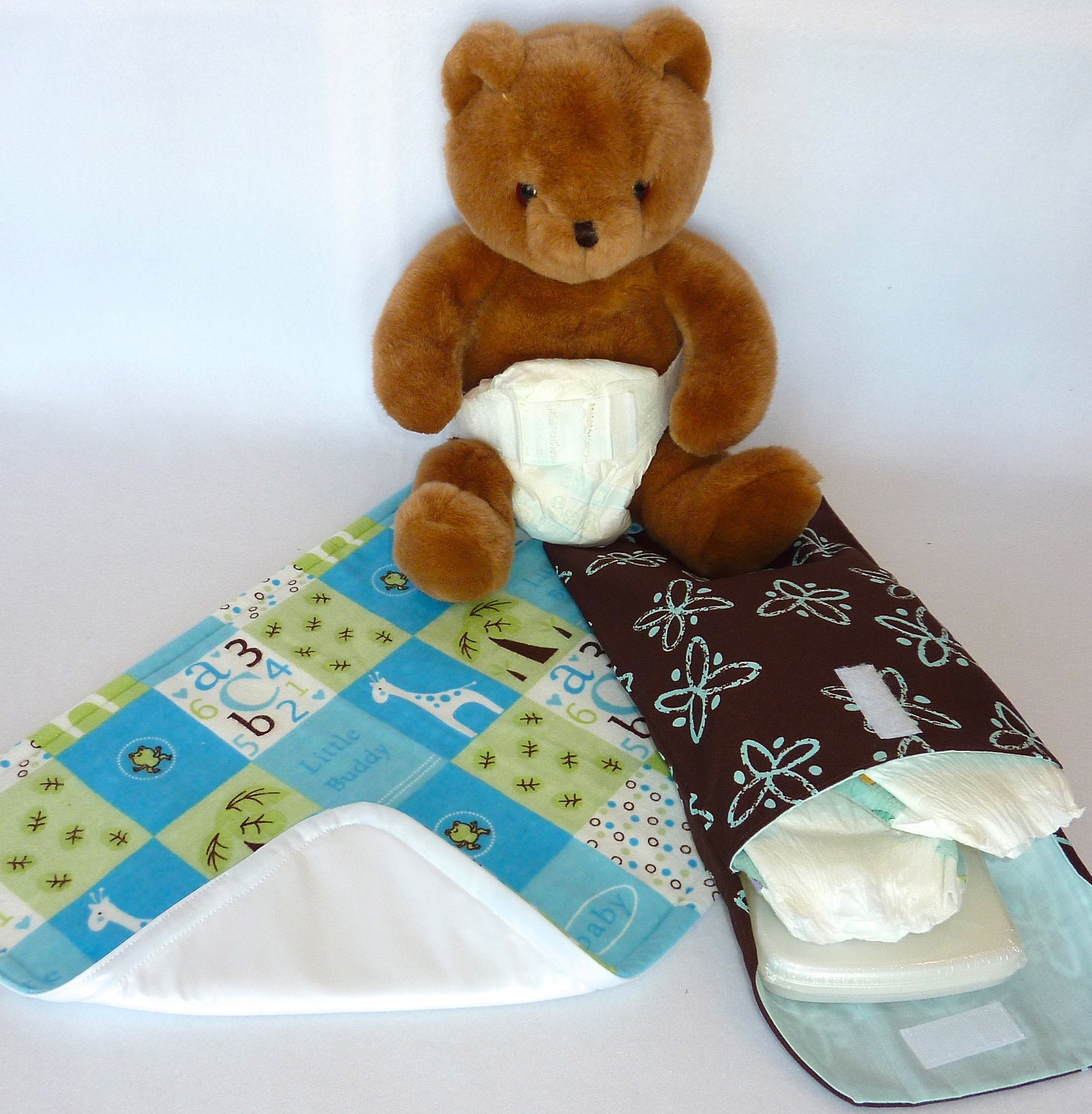 Little Buddy Changing Pouch Set includes: Changing Pad & Pouch