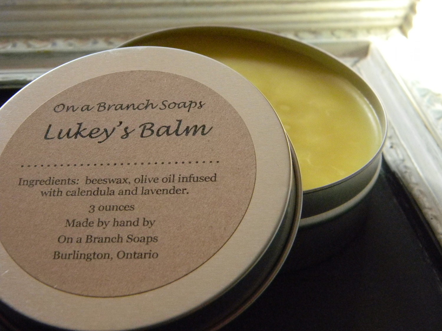 Lukey's Balm --  Calendula and Lavender, olive oil, beeswax, on a branch soaps