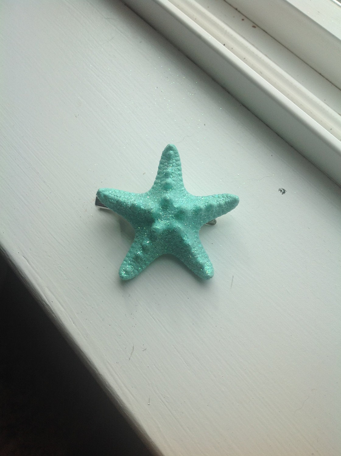 Petite Mint colored knobby starfish hair clip