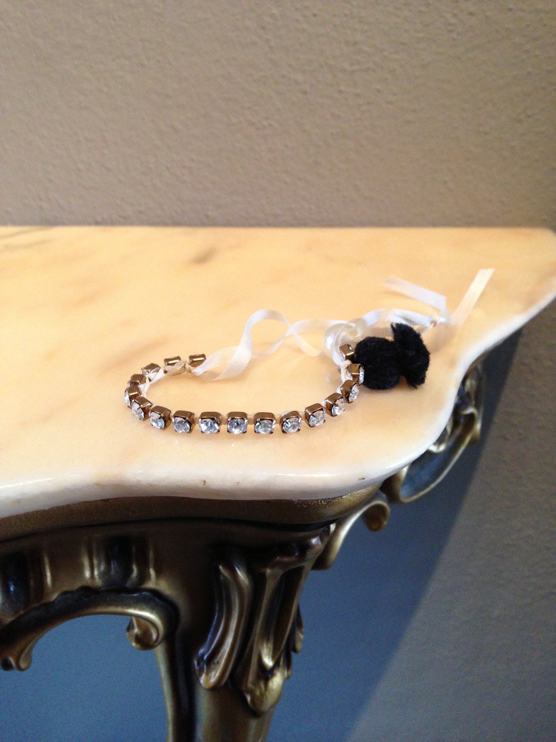 Genuine Swarovski Friendship Bracelet, Crystal Wrapped Bronze Metal Chain with Pearl Closure and Black Yarn Tassel