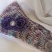 Ear Warmer Headband Headwrap Hand Knit In Multi Colored Purple with Purple Shabby Frayed Flowers and a Lavender Rhinestone Accent