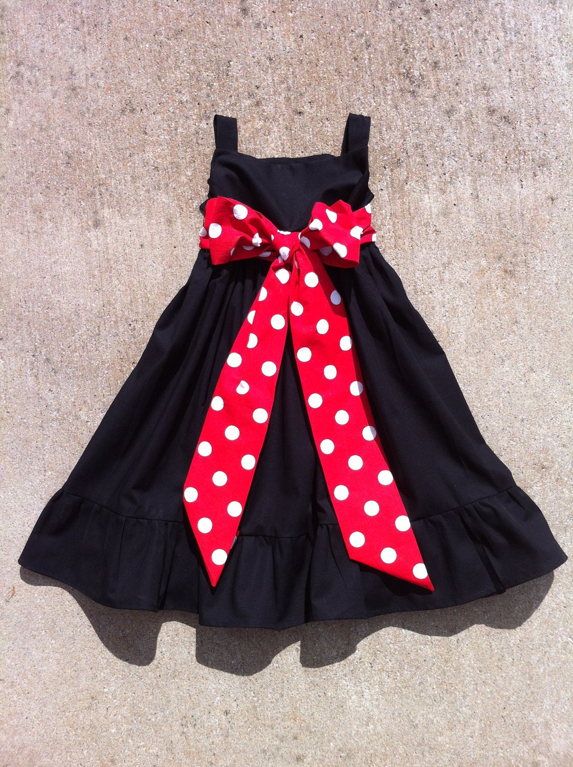 Girls Little Black Dress with ruffle detail.  Red white or any color polka dot sash. Custom children's clothing By EverythingSorella
