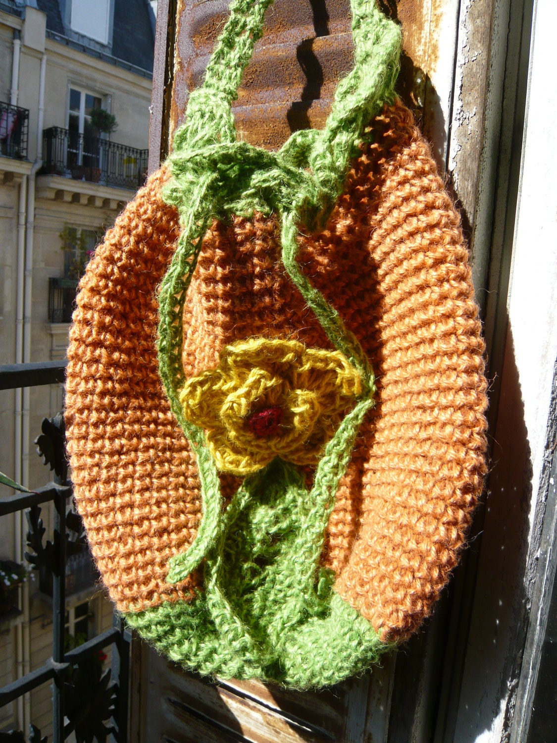 handmade crocheted jute twine pumpkin bag,tote, colourful,orange,yellow,green,red,with a flower and a leaf,Chiaia pattern