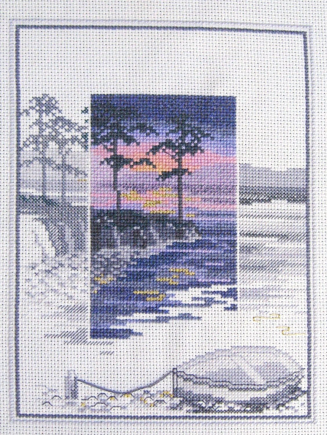 Finished Cross-stitch Sunset on the Coast in Blues, Pinks, Purples & Blacks